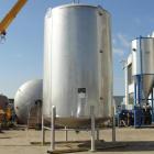 Used- Walker 5000 Gallon Vertical 304 Stainless Steel Tank. This tank has a dome top and a dish bottom. The tank diameter is...