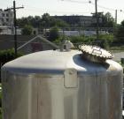 Used- Walker 5000 Gallon Vertical 304 Stainless Steel Tank. This tank has a dome top and a dish bottom. The tank diameter is...