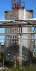 Used Walker Storage Tank, 16,000 Gallon, 316L stainless steel, vertical. Approximate 12' diameter x 18' straight side, dish top and bottom. Misc top and side flanged openings. Side openings include a...