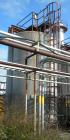 Used Walker Storage Tank, 16,000 Gallon, 316L stainless steel, vertical. Approximate 12' diameter x 18' straight side, dish top and bottom. Misc top and side flanged openings. Side openings include a...