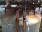 Used Walker Storage Tank, 16,000 Gallon, 316L stainless steel, vertical. Approximate 12' diameter x 18' straight side, dish top and bottom. Misc top and side flanged openings. Side openings include a...