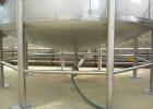 Used Walker Storage Tank, Model SS, 21,000 gallon, 304L stainless steel, vertical. Approximate 12' diameter x 24' straight side, dish top and bottom. Top openings include an 18
