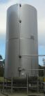 Used Walker Storage Tank, Model SS, 21,000 gallon, 304L stainless steel, vertical. Approximate 12' diameter x 24' straight side, dish top and bottom. Top openings include an 18