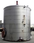 Used Walker Stainless Tank, 8500 Gallon, 304 Stainless Steel, Vertical. Approximate 132” diameter x 144” straight side, coned top, flat bottom. Top entering disperser, approximate 1-1/2” diameter x 8...