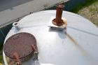 Used Walker Stainless Tank, 8500 Gallon, 304 Stainless Steel, Vertical. Approximate 132” diameter x 144” straight side, coned top, flat bottom. Top entering disperser, approximate 1-1/2” diameter x 8...
