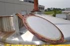 Used Walker Stainless Tank, 8500 Gallon, 304 Stainless Steel, Vertical. Approximate 132” diameter x 144” straight side, coned top, flat bottom. Top entering disperser, approximate 1-1/2” diameter x 8...