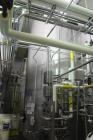 Used Walker 12,000 Gallon Jacketed Agitated Stainless Steel Tank.