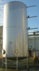 USED: Walker 21,000 gallon, type 304L stainless steel, storage tank. Vertical, dished heads, approximate 12' diameter x 24' ...