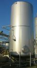 USED: Walker 21,000 gallon, type 304L stainless steel, storage tank. Vertical, dished heads, approximate 12' diameter x 24' ...