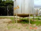 USED: Walker 5,000 gallon, type 304L stainless steel, storage tank. Vertical, dished heads. Approximate 8' diameter x 12' straight side. Misc top and side flanged openings. Bottom has a 2