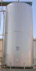 USED: Walker 21,000 gallon, type 304L stainless steel, storage tank. Vertical, dished heads, approximate 12' diameter x 24' straight side. Top openings include an 18