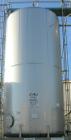 USED: Walker 21,000 gallon, type 304L stainless steel, storage tank. Vertical, dished heads, approximate 12' diameter x 24' straight side. Top openings include an 18