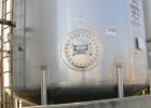 USED: Walker 21,000 gallon, type 304L stainless steel, storage tank. Vertical, dished heads, approximate 12' diameter x 24' straight side. Top openings include an 18