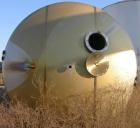USED: Walker 21,000 gallon, type 304L stainless steel, storage tank. Vertical, dished heads, approximate 12' diameter x 24' straight side. Top openings include an 18