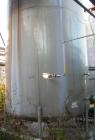 USED: Walker 16,000 gallon, type 316L stainless steel, storage tank. Vertical, dished heads. Approximate 12' diameter x 18' straight side. Misc top and side flanged openings. Side openings include an...