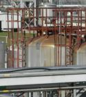 USED: Walker 16,000 gallon, type 316L stainless steel, storage/mix tank. Vertical, dished heads. Approximate 12' diameter x 18' straight side. Misc top and side flanged openings. Side openings includ...