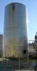 USED: Walker 21,000 gallon, type 304L stainless steel, storage tank. Vertical, dished heads. 12' diameter x 24' straight side. Top openings include an 18