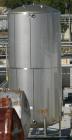 USED: Walker 21,000 gallon, type 304L stainless steel, storage tank. Vertical, dished heads. 12' diameter x 24' straight side. Top openings include an 18