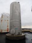 Used Whiting Metals 6,500 gal 316L Stainless Steel Vertical Tank.  Rated ATM @ 150 F. Dimensions:  8'dia x 21'h.  Flat bottom. Serial # F-7069. Built 1996.