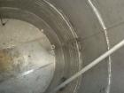 Used- Wolfe Mechanical and Equipment Tank, 14,000 gallon, 304L stainless steel, vertical. Approximately 144