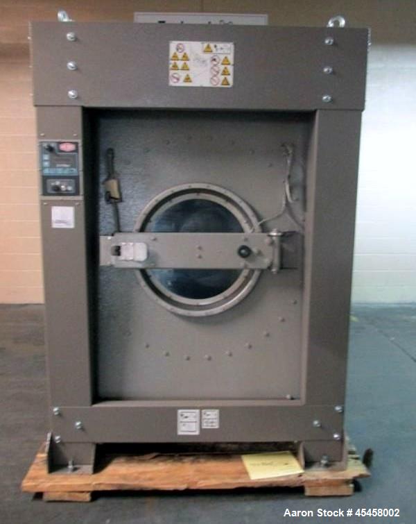 Used Milnor washer-extractor, model 42032 X7J, 170 lb capacity, 24"opening,  42" diameter x 32" deep chamber, 25.7 cu ft cylinder volume, rated for 709 maximum RPM (during extraction), 15 hp motor, 4...