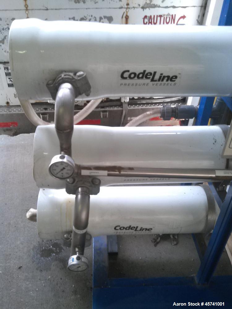 Used Ionic Ahlfinger Water Company Reverse Osmosis System. Baldor 15 hp electric motor, 480 volts, 3 phase mounted on Grundfos CR8 15 hp pump. Filterite model number 9100715-000 type 12 FM, (3) Code ...