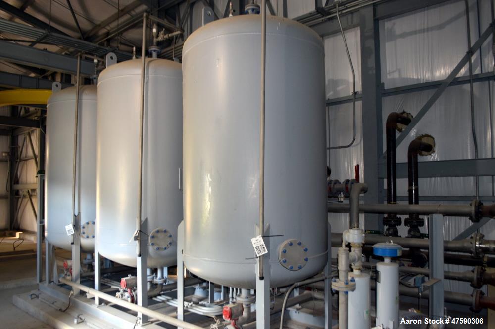 Unused- Reetex Multimedia Filter System Consisting Of: (3) Filter vessels, 304 stainless steel. Each 54" Diameter x 72" straight side, dished top and bottom. Internal rated 75 psi at -20 to 100 degre...