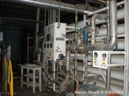 Used Zenon Environmental Inc Reverse Osmosis System. 250 psi operating pressure at 35 deg C, perm rate 240 USGPM, 11 tubes are 9" diameter and 12'6" in length, 120V, 15A, 1 phase, 60 Hz. System has 1...