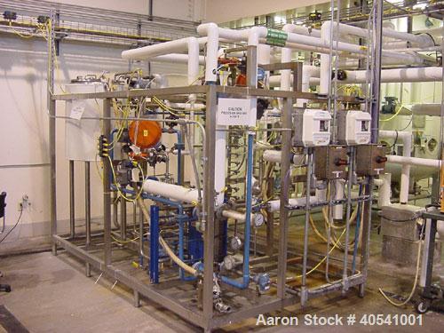 Used APV Invensys 5 Gallons Per Minute Continuous Media Sterilization System. Includes 5 minute hold loop, 50 gallon balance tank, APV plate heat exchanger, APV steam injector with tri-clamps, magnet...