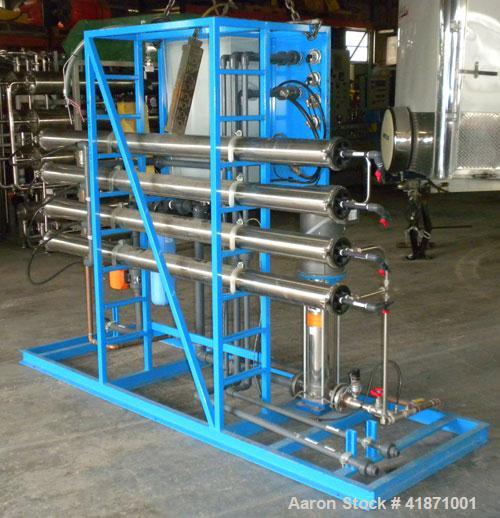 Used Applied Membranes Inc Reverse Osmosis System, model J-84B-236, 316 stainless steel. Designed to produce low dissolved solids water from tap or well water. Designed operating conditions: Permeate...