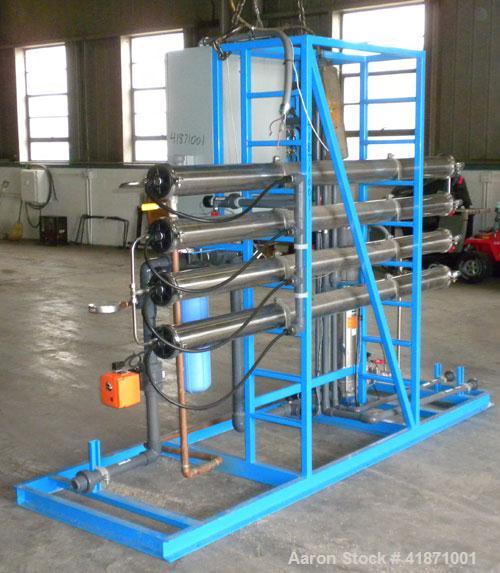 Used Applied Membranes Inc Reverse Osmosis System, model J-84B-236, 316 stainless steel. Designed to produce low dissolved solids water from tap or well water. Designed operating conditions: Permeate...