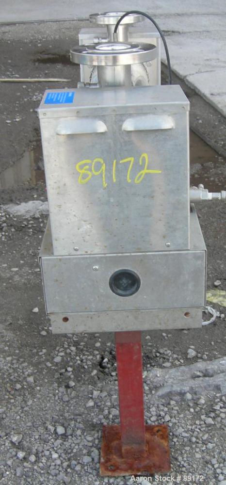 Used Aquafine Ultraviolet Disinfection Unit, 316 stainless steel. Approximate 4" diameter x 30" long tube. 2" inlet/outlet. Mounted on 2 carbon steel legs.