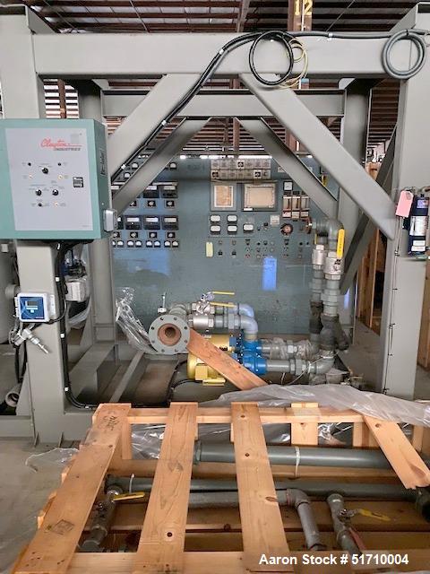 Used Clayton Industries Feedwater Treatment System. (1) Tank. Frame with control panel & (2) pumps. (2) Water softners.