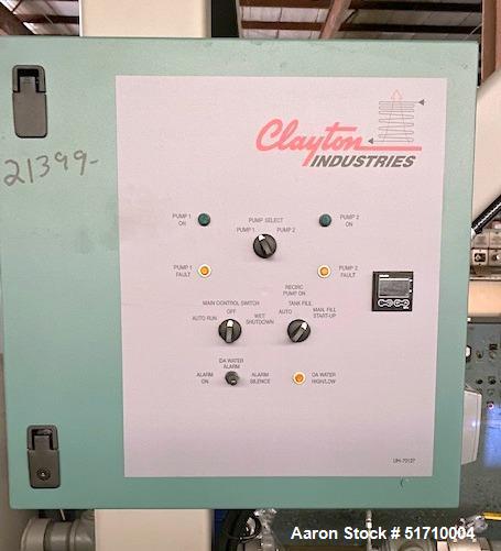 Used Clayton Industries Feedwater Treatment System. (1) Tank. Frame with control panel & (2) pumps. (2) Water softners.