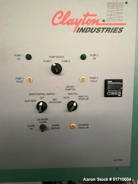 Used Clayton Industries Feedwater Treatment System. (1) Tank. Frame with control panel & (2) pumps. (2) Water softners.