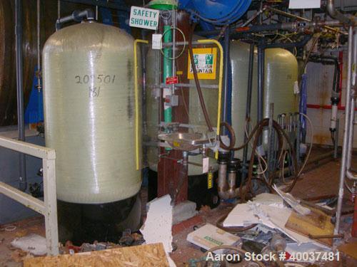 Used DI Regeneration System consisting of: (1) Culligan Vinylester H-FLO 42 carbon filter tank, approximately 150 gallon, rated 150 psi at 35-120 deg F; (1) Culligan Vinylester H-FLO 42 sand filter t...