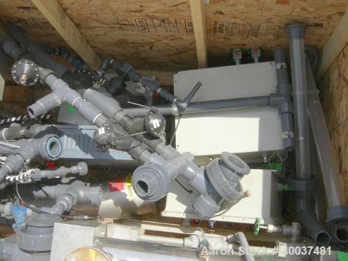 Used DI Regeneration System consisting of: (1) Culligan Vinylester H-FLO 42 carbon filter tank, approximately 150 gallon, rated 150 psi at 35-120 deg F; (1) Culligan Vinylester H-FLO 42 sand filter t...