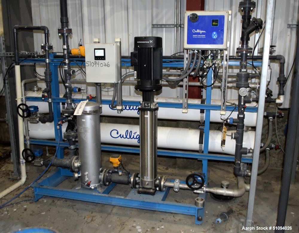 Used Culligan G Series Dual Membrane Reverse Osmosis System. Consisting of: (2) Culligan Model C-300P-8 membrane pressure vessels, (1) Grundfos vertical pump, (1) cartridge filter housing, (1) XP con...