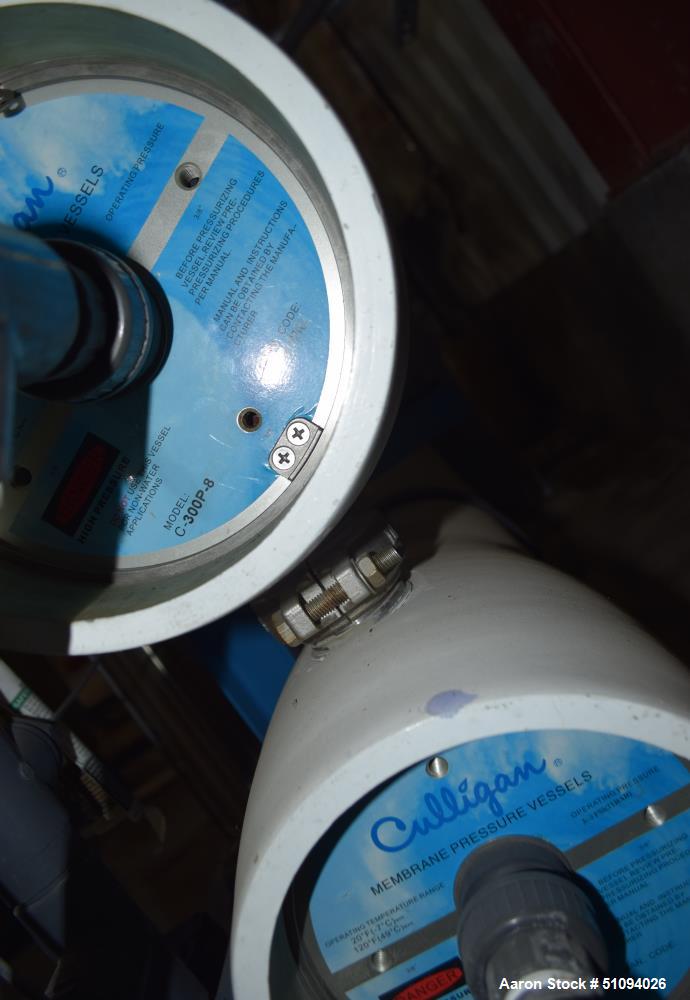 Used Culligan G Series Dual Membrane Reverse Osmosis System. Consisting of: (2) Culligan Model C-300P-8 membrane pressure vessels, (1) Grundfos vertical pump, (1) cartridge filter housing, (1) XP con...