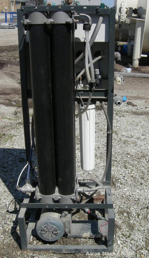USED: Culligan Aqua-Cleer Series M water treatment reverse osmosis system. Approximately 1 gallon per minute flow rate. Max operating pressure 200 psi. (2) Cartridges, 39,315 hours on meter.