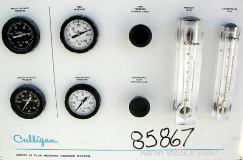 USED: Culligan Aqua-Cleer Series M water treatment reverse osmosis system. Approximately 1 gallon per minute flow rate. Max operating pressure 200 psi. (2) Cartridges, 39,315 hours on meter.