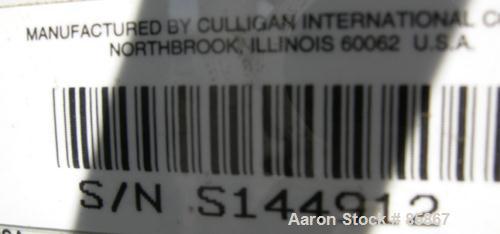 USED: Culligan Aqua-Cleer Series M water treatment reverse osmosis system. Approximately 1 gallon per minute flow rate. Max operating pressure 200 psi. (2) Cartridges, 39,315 hours on meter.