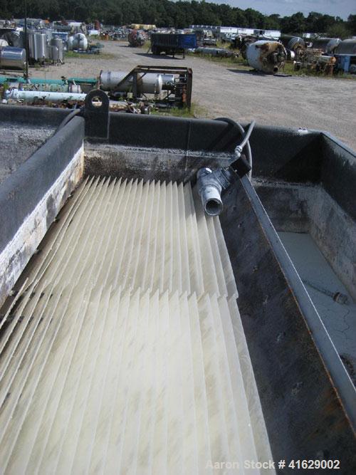 Used Great Lakes Slant Plate Clarifier, carbon steel. Includes chemical feed system, flash mix tank, floculation tank, and turbidmeter.
