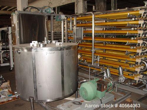 Used Koch Supercor Multi Pass UF Membrane Filter System consisting of: Membrane filter system, membrane filter, control panel, 300 gallon stainless steel sloped bottom permeate CIP tank, pump, typica...
