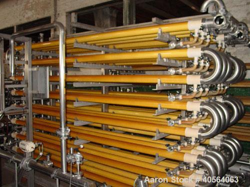 Used Koch Supercor Multi Pass UF Membrane Filter System consisting of: Membrane filter system, membrane filter, control panel, 300 gallon stainless steel sloped bottom permeate CIP tank, pump, typica...