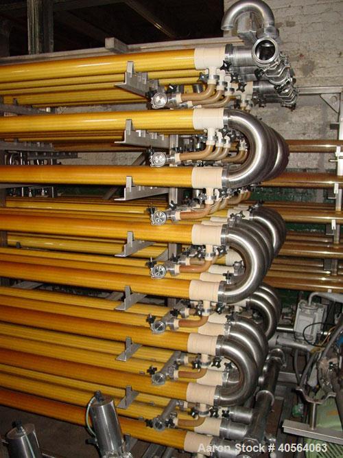 Used Koch Supercor Multi Pass UF Membrane Filter System consisting of: Membrane filter system, membrane filter, control panel, 300 gallon stainless steel sloped bottom permeate CIP tank, pump, typica...