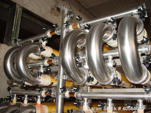 Used Koch Supercor Multi Pass UF Membrane Filter System consisting of: Membrane filter system, membrane filter, control panel, 300 gallon stainless steel sloped bottom permeate CIP tank, pump, typica...