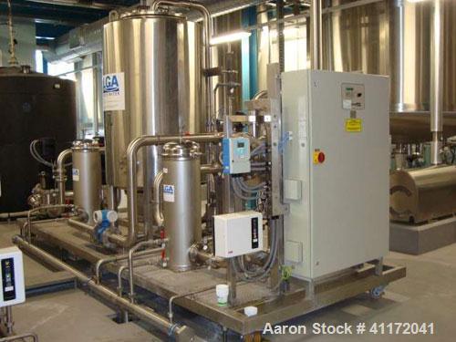 Used Vivendi Purified Water Softener Skids consisting of: (1) Forbes approximately 10,000 litre HDPE tank, (2) Grunfoss type CRNE45-2, 45cumt/hr pumps, (1) Elga model 611530AA40C1EE filter, (1) Bibby...