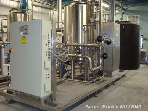 Used Vivendi Purified Water Softener Skids consisting of: (1) Forbes approximately 10,000 litre HDPE tank, (2) Grunfoss type CRNE45-2, 45cumt/hr pumps, (1) Elga model 611530AA40C1EE filter, (1) Bibby...
