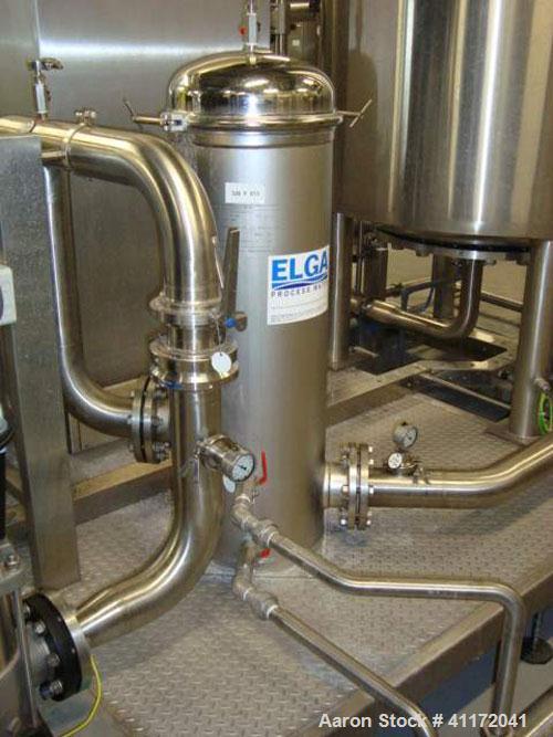 Used Vivendi Purified Water Softener Skids consisting of: (1) Forbes approximately 10,000 litre HDPE tank, (2) Grunfoss type CRNE45-2, 45cumt/hr pumps, (1) Elga model 611530AA40C1EE filter, (1) Bibby...